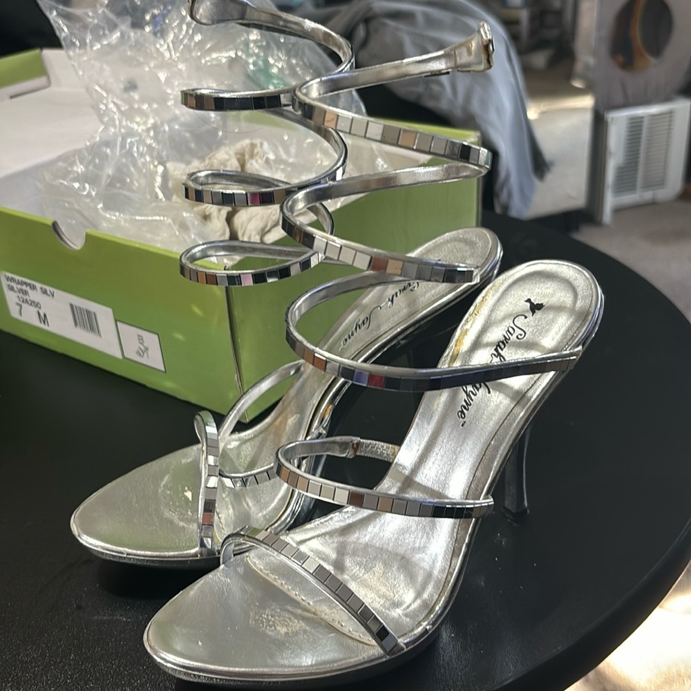 Wrap around the ankle silver heels